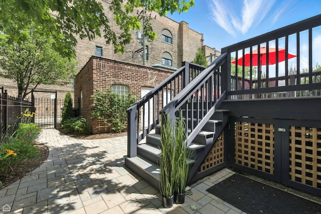 4525 N Artesian Ave, Chicago, IL 60625 - view of patio / terrace with stairs and a gate