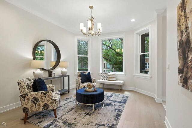 4525 N Artesian Ave, Chicago, IL 60625 - sitting room with ornamental molding, a chandelier, wood finished floors, and recessed lighting