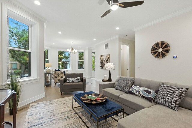 4525 N Artesian Ave, Chicago, IL 60625 - living area with plenty of natural light, crown molding, light wood-style flooring, recessed lighting, and a chandelier