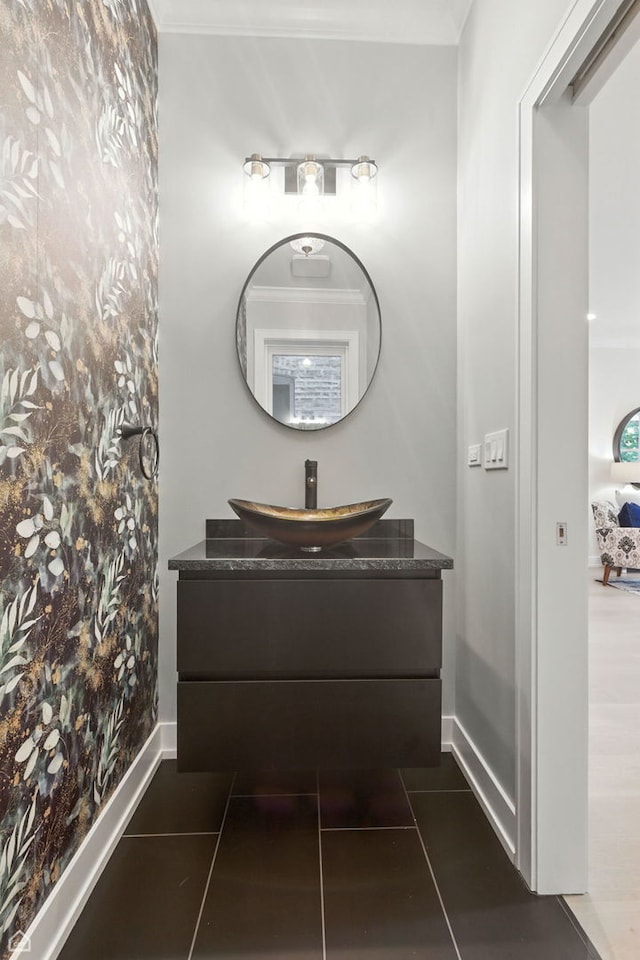 4525 N Artesian Ave, Chicago, IL 60625 - bathroom with vanity, tile patterned flooring, and ornamental molding