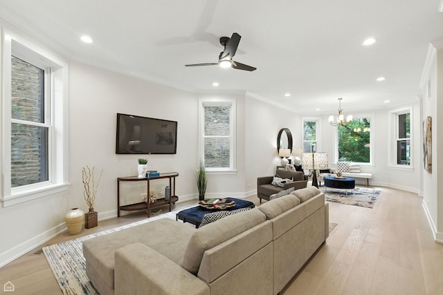 4525 N Artesian Ave, Chicago, IL 60625 - living area featuring recessed lighting, ornamental molding, a chandelier, light wood-style floors, and ceiling fan
