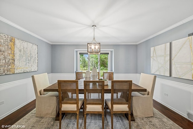 10 N Highview Cir, Hawthorn Woods, IL 60047 - dining area featuring a chandelier, wood finished floors, and crown molding