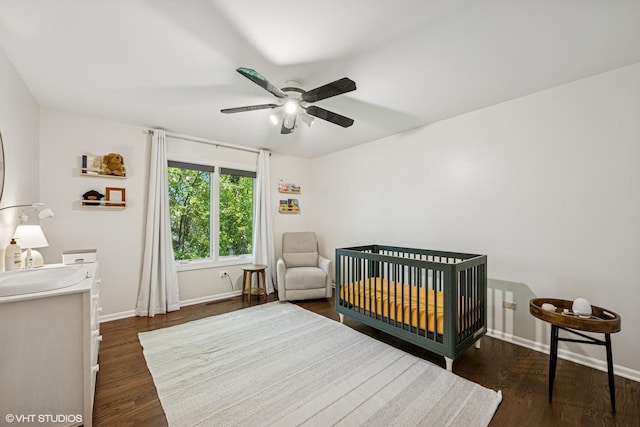 10 N Highview Cir, Hawthorn Woods, IL 60047 - bedroom with wood finished floors, a nursery area, and a ceiling fan
