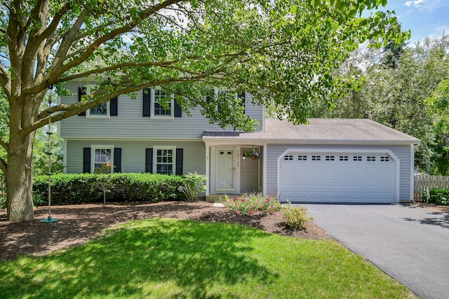 1605 Rita Ave, Saint Charles, IL 60174 - view of front of property featuring driveway, a garage, and a front yard