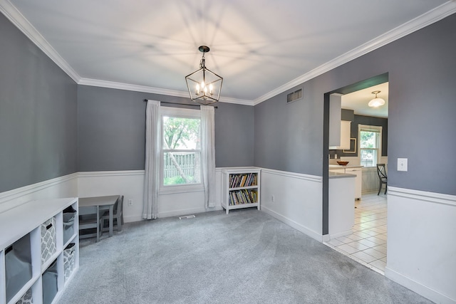 1605 Rita Ave, Saint Charles, IL 60174 - unfurnished room with crown molding, a chandelier, and carpet flooring