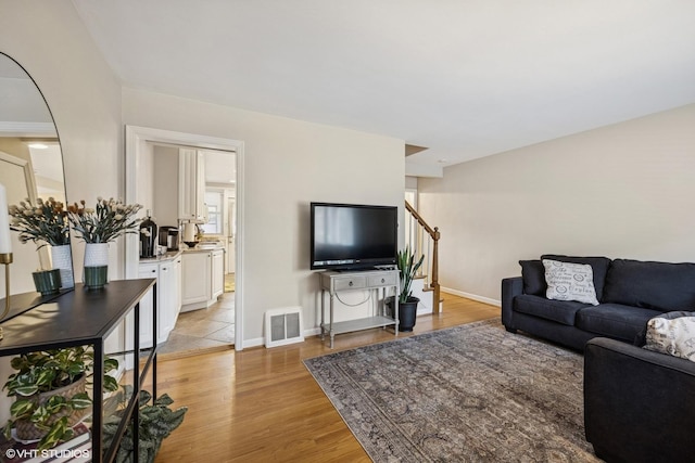8041 W 29th Ct, North Riverside, IL 60546 - living room featuring light wood-type flooring and stairs