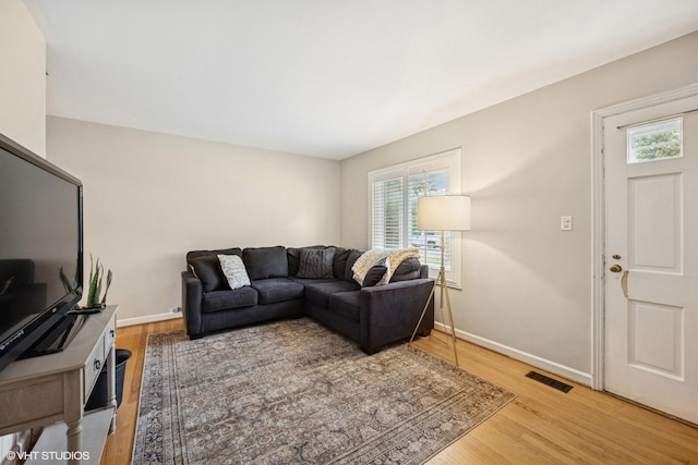 8041 W 29th Ct, North Riverside, IL 60546 - living room featuring healthy amount of natural light and wood finished floors