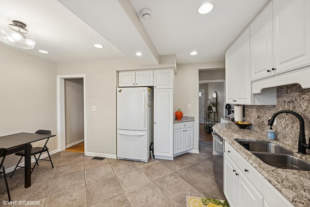 8041 W 29th Ct, North Riverside, IL 60546 - kitchen featuring freestanding refrigerator, tasteful backsplash, recessed lighting, white cabinetry, and stainless steel dishwasher