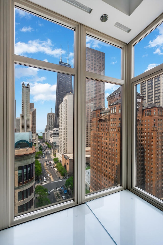 118 E Erie St Unit 21C, Chicago, IL 60611 - doorway to outside with a city view and a wall of windows