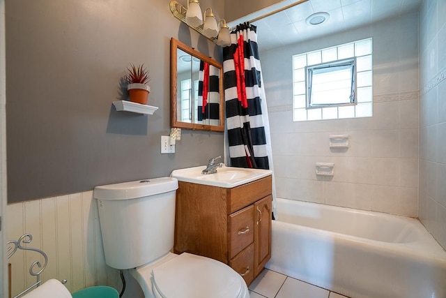 8112 Christie Ave, Lyons, IL 60534 - bathroom with vanity, wainscoting, shower / tub combo with curtain, and tile patterned floors