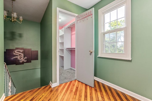 8112 Christie Ave, Lyons, IL 60534 - hall with a chandelier and wood finished floors