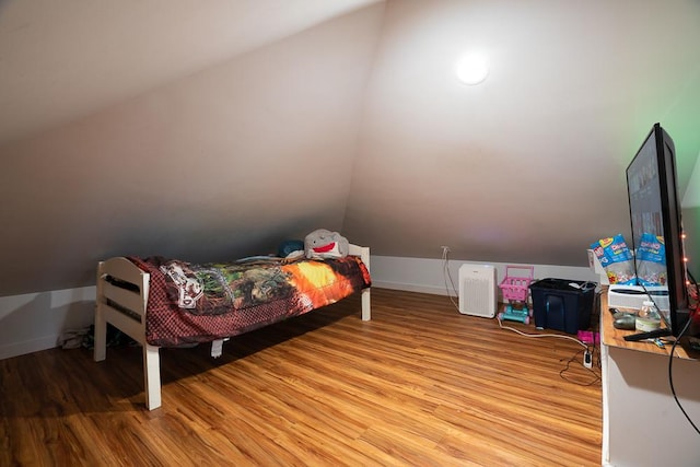 8112 Christie Ave, Lyons, IL 60534 - bedroom featuring vaulted ceiling and light wood-type flooring