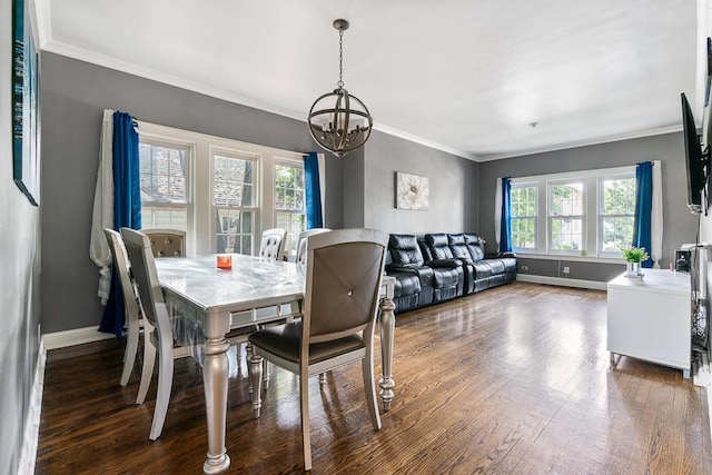 8112 Christie Ave, Lyons, IL 60534 - dining room featuring a chandelier, healthy amount of natural light, wood finished floors, and crown molding
