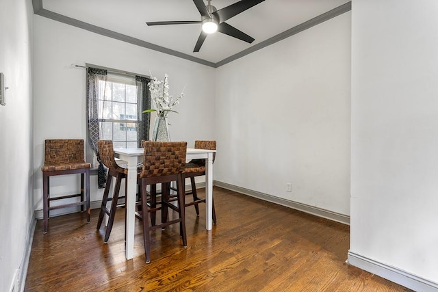 8112 Christie Ave, Lyons, IL 60534 - dining room featuring ornamental molding, a ceiling fan, and wood finished floors