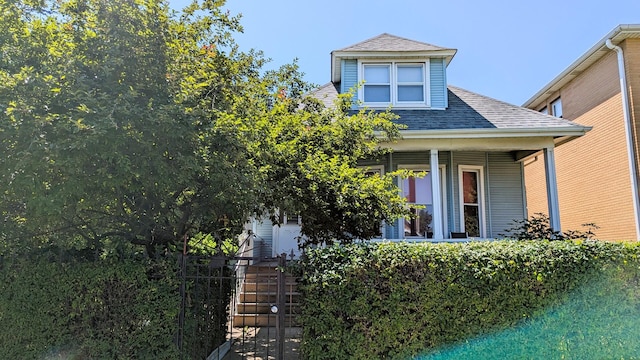 6240 S Kolmar Ave, Chicago, IL 60629 - view of front of property with stairs, a porch, and roof with shingles