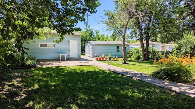 6240 S Kolmar Ave, Chicago, IL 60629 - back of house with a lawn and an outdoor structure