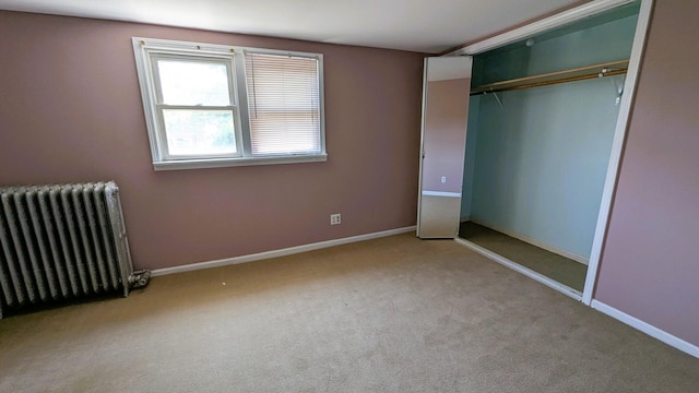 6240 S Kolmar Ave, Chicago, IL 60629 - unfurnished bedroom featuring radiator heating unit, carpet, and a closet
