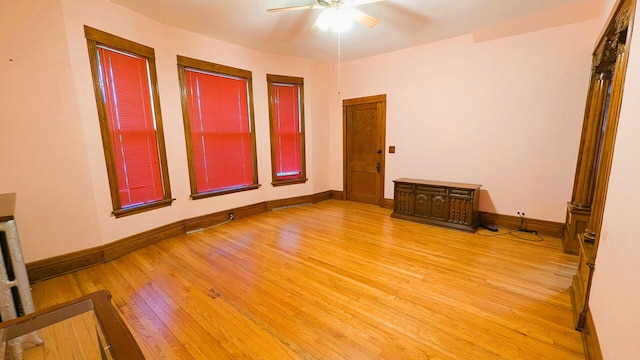 6240 S Kolmar Ave, Chicago, IL 60629 - spare room with light wood finished floors and a ceiling fan