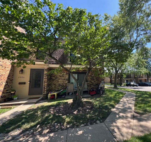 2086 Country Club Dr Unit 3F, Woodridge, IL 60517 - view of front of house featuring brick siding