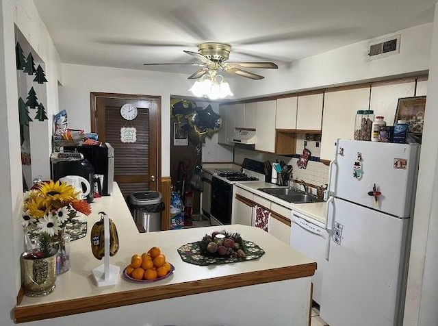 2086 Country Club Dr Unit 3F, Woodridge, IL 60517 - kitchen featuring white appliances, a ceiling fan, light countertops, white cabinetry, and decorative backsplash