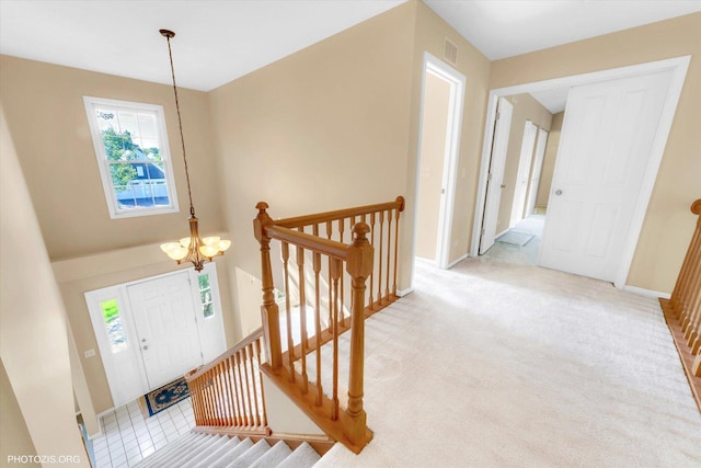 1175 Oxford Ct, Lake Zurich, IL 60047 - carpeted foyer featuring a chandelier and baseboards
