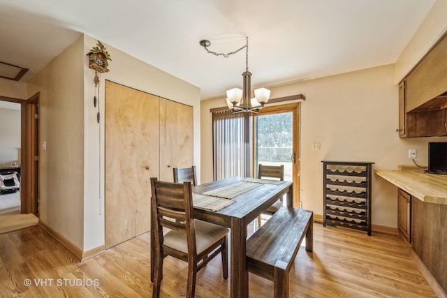 11607 Frederick Way, Huntley, IL 60142 - dining space featuring light wood-style floors and a chandelier