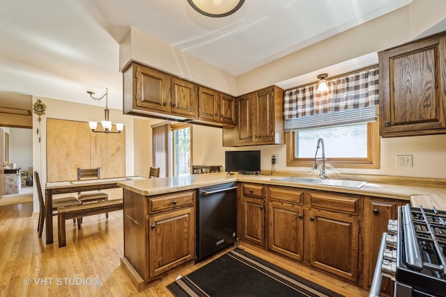 11607 Frederick Way, Huntley, IL 60142 - kitchen featuring dishwasher, range, a peninsula, and healthy amount of natural light