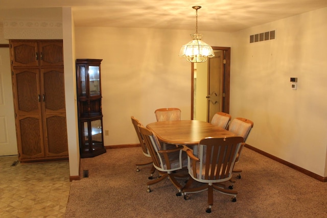 28 Manorhill Dr, Clinton, IL 61727 - dining area with baseboards and a chandelier