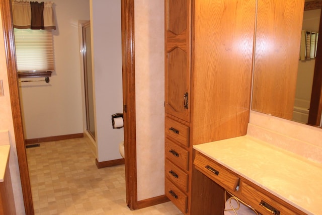 28 Manorhill Dr, Clinton, IL 61727 - full bathroom with vanity, tile patterned floors, and a shower stall