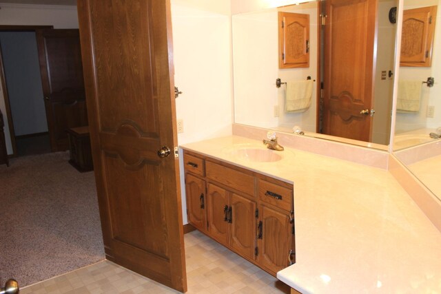28 Manorhill Dr, Clinton, IL 61727 - bathroom featuring vanity and tile patterned floors