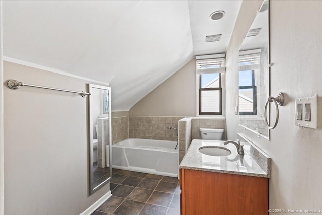659 W Albert St, Elmhurst, IL 60126 - full bathroom featuring a bath, vaulted ceiling, vanity, and tile patterned floors