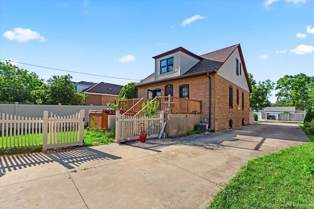 659 W Albert St, Elmhurst, IL 60126 - bungalow-style home with brick siding and driveway