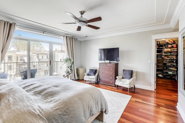 846 W Roscoe St Unit 3W, Chicago, IL 60657 - bedroom featuring crown molding, access to exterior, wood finished floors, a spacious closet, and a ceiling fan