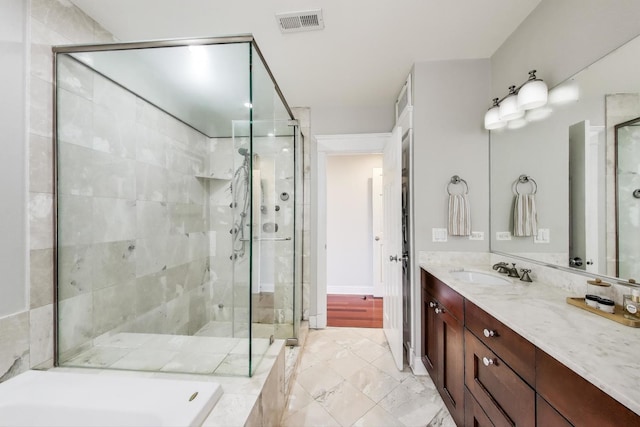 846 W Roscoe St Unit 3W, Chicago, IL 60657 - full bathroom with a stall shower, vanity, and a garden tub