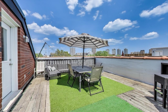 846 W Roscoe St Unit 3W, Chicago, IL 60657 - view of yard with a deck and a view of city