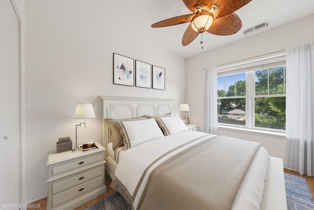 965 Rogers St Unit 202, Downers Grove, IL 60515 - bedroom with wood finished floors and ceiling fan