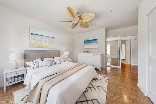 965 Rogers St Unit 202, Downers Grove, IL 60515 - bedroom featuring light wood-type flooring and a ceiling fan