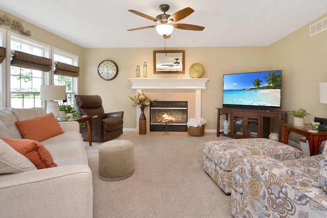 3115 Sable Oaks Rd, Bloomington, IL 61704 - living area featuring carpet flooring, ceiling fan, and a tiled fireplace