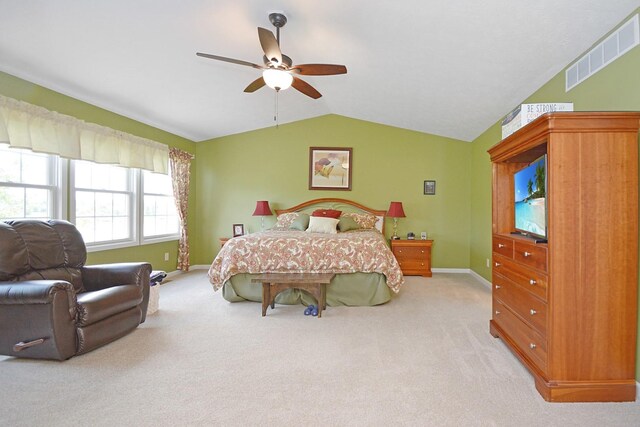 3115 Sable Oaks Rd, Bloomington, IL 61704 - carpeted bedroom with vaulted ceiling and ceiling fan