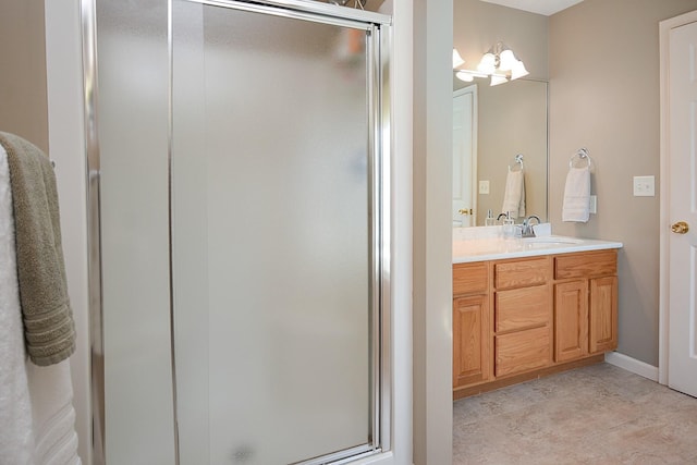 3115 Sable Oaks Rd, Bloomington, IL 61704 - full bath with a shower stall, vanity, and a chandelier