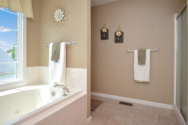 3115 Sable Oaks Rd, Bloomington, IL 61704 - bathroom with a garden tub and a shower with shower door