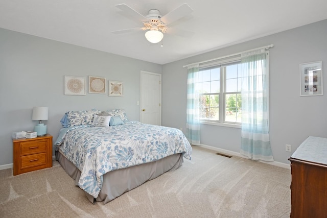 3115 Sable Oaks Rd, Bloomington, IL 61704 - bedroom featuring light carpet and a ceiling fan