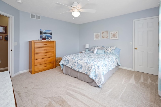 3115 Sable Oaks Rd, Bloomington, IL 61704 - carpeted bedroom with baseboards and a ceiling fan