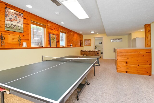 3115 Sable Oaks Rd, Bloomington, IL 61704 - rec room with carpet floors, recessed lighting, and wood walls