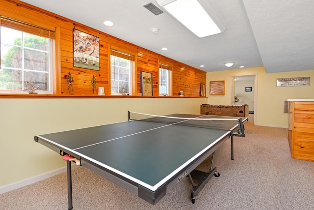 3115 Sable Oaks Rd, Bloomington, IL 61704 - recreation room with carpet floors, healthy amount of natural light, recessed lighting, and wooden walls