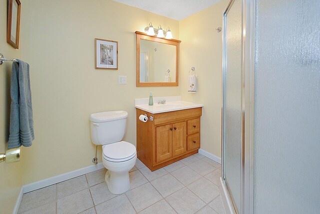 3115 Sable Oaks Rd, Bloomington, IL 61704 - full bathroom featuring tile patterned floors, vanity, and a shower stall