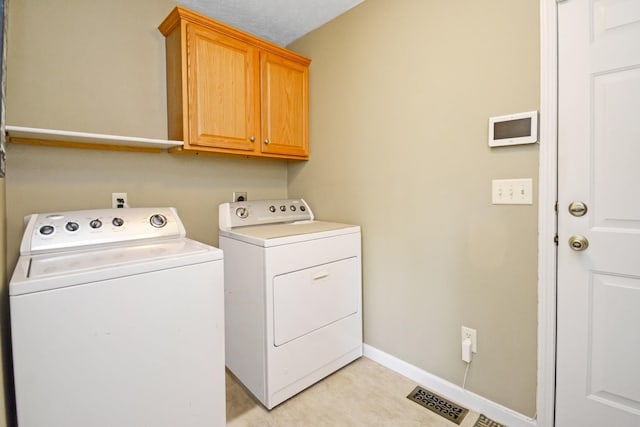 3115 Sable Oaks Rd, Bloomington, IL 61704 - laundry area with independent washer and dryer and cabinet space