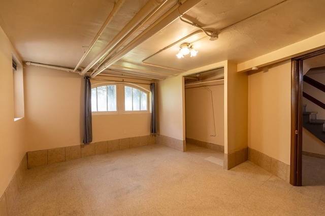 unfurnished bedroom featuring a closet and carpet flooring