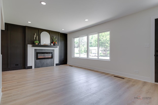 222 S Maple St, Palatine, IL 60067 - unfurnished living room featuring a glass covered fireplace, light wood-style flooring, and recessed lighting