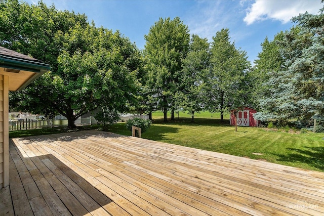 1225 Whitetail Ln, Sandwich, IL 60548 - wooden terrace featuring a shed and view of scattered trees